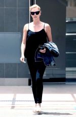 CHARLIZE THERON Out and About in Beverly Hills 06/22/2017