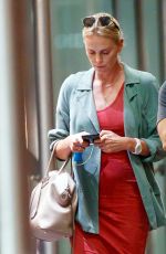 CHARLIZE THERON Out and About in New York 06/25/2017