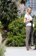 CORINNE OLYMPIOS Walks Her Dog Out in Los Angeles 06/15/2017
