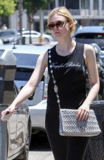 ELLE FANNING in Tights Out in Los Angeles 06/13/2017