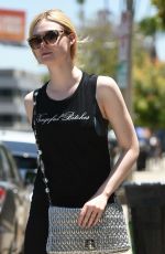 ELLE FANNING in Tights Out in Los Angeles 06/13/2017