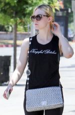 ELLE FANNING in Tights Out in Los Angeles 06/13/2017