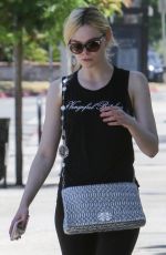 ELLE FANNING in Tights Out in Los Angeles 06/13/2017