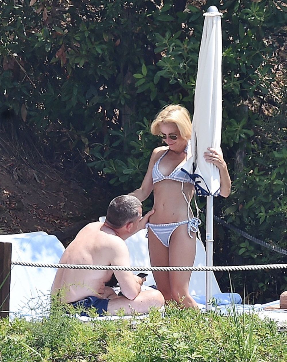 GILLIAN ANDERSON in Bikini on Vacation in Portofino 06/21/2017.