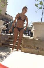 HAILEY BALDWIN in Bikini at a Pool in Beverly Hills 06/02/2017