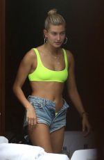 HAILEY BALDWIN in Bikini Top and Denim Shorts at a Pool in Miami 06/09/2017