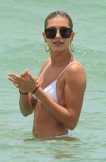 HAILEY BALDWIN in White Bikini on the Beach in Miami 06/12/2017