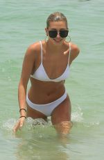 HAILEY BALDWIN in White Bikini on the Beach in Miami 06/12/2017