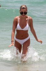 HAILEY BALDWIN in White Bikini on the Beach in Miami 06/12/2017