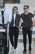 KATE MARA and JAMIE BELL at Charles De Gaulle Airport in Paris 06/24/2017