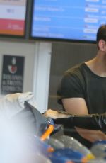 KATE MARA and JAMIE BELL at Charles De Gaulle Airport in Paris 06/24/2017