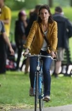 KATIE HOLMES Riding a Bike on the Set of The Gift in Montreal 06/22/2017
