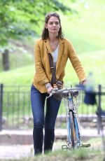 KATIE HOLMES Riding a Bike on the Set of The Gift in Montreal 06/22/2017