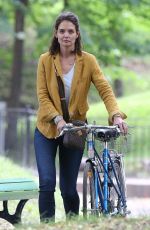 KATIE HOLMES Riding a Bike on the Set of The Gift in Montreal 06/22/2017