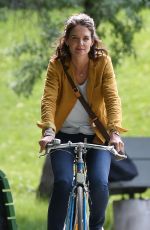 KATIE HOLMES Riding a Bike on the Set of The Gift in Montreal 06/22/2017