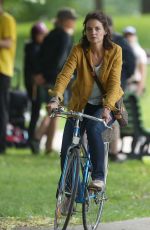 KATIE HOLMES Riding a Bike on the Set of The Gift in Montreal 06/22/2017