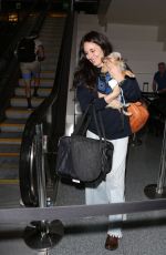 MADELEINE STOWE with Her Dog at LAX Airport in Los Angeles 05/31/2017