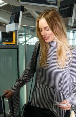 MARGOT ROBBIE Arrives at Heathrow Airport in London 06/01/2017