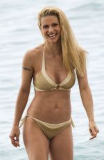 MICHELLE HUNZIKER in Bikini at a Beach in Varigotti 06/22/2017