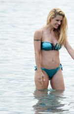 MICHELLE HUNZIKER in Bikini on the Beach in Varigotti 06/22/2017