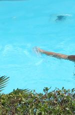 MICHELLE HUNZIKER in Swimsuit at a Pool in Bergamo 06/25/2017