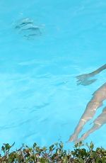MICHELLE HUNZIKER in Swimsuit at a Pool in Bergamo 06/25/2017