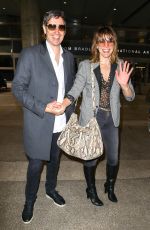 MILLA JOVOVICH at LAX Airport in Los Angeles 06/04/2017