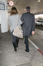 MILLA JOVOVICH at LAX Airport in Los Angeles 06/04/2017