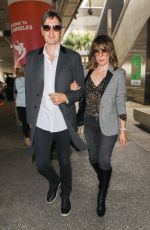 MILLA JOVOVICH at LAX Airport in Los Angeles 06/04/2017