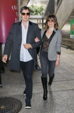MILLA JOVOVICH at LAX Airport in Los Angeles 06/04/2017