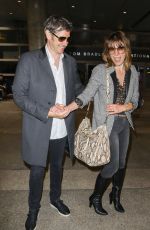 MILLA JOVOVICH at LAX Airport in Los Angeles 06/04/2017