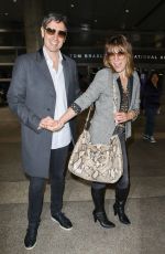 MILLA JOVOVICH at LAX Airport in Los Angeles 06/04/2017