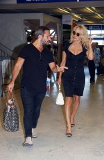 PAMELA ANDERSON at Orly Airport in Paris 06/19/2017