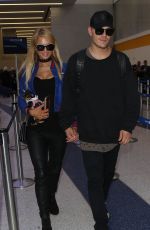 PARIS HILTON and Chris Zylka at LAX Airport in Los Angeles 06/08/2017