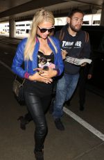 PARIS HILTON and Chris Zylka at LAX Airport in Los Angeles 06/08/2017