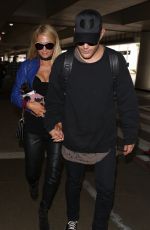 PARIS HILTON and Chris Zylka at LAX Airport in Los Angeles 06/08/2017
