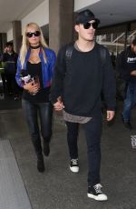PARIS HILTON and Chris Zylka at LAX Airport in Los Angeles 06/08/2017