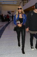 PARIS HILTON and Chris Zylka at LAX Airport in Los Angeles 06/08/2017
