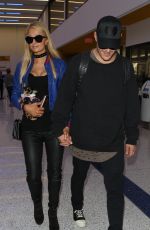 PARIS HILTON and Chris Zylka at LAX Airport in Los Angeles 06/08/2017