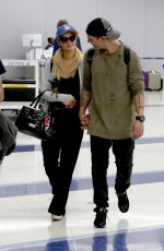 PARIS HILTON and Chris Zylka at LAX Airport in Los Angeles 06/11/2017