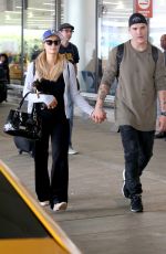 PARIS HILTON and Chris Zylka at LAX Airport in Los Angeles 06/11/2017