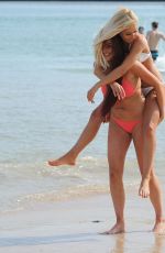 SARAH GOODHART and HOLLY RICKWOOD in Bikinis at a Beach in Ibiza 06/07/2017