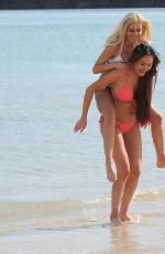 SARAH GOODHART and HOLLY RICKWOOD in Bikinis at a Beach in Ibiza 06/07/2017