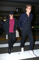 VANESSA HUDGENS and Austin Butler at LAX Airport in Los Angeles 06/26/2017