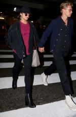 VANESSA HUDGENS and Austin Butler at LAX Airport in Los Angeles 06/26/2017
