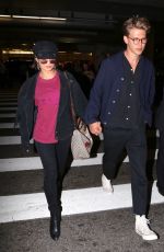 VANESSA HUDGENS and Austin Butler at LAX Airport in Los Angeles 06/26/2017