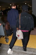 VANESSA HUDGENS and Austin Butler at LAX Airport in Los Angeles 06/26/2017