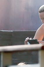 ALANIS MORISSETTE in Swimsuit at a Beach in Malibu 07/09/2017