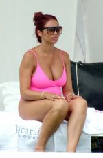 AMY CHILDS in Swimsuit at a Pool in Ibiza 07/19/2017