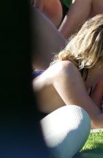 ASHLEY BENSON in Bikini at a Pool in Miami 07/03/2017